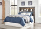 Drystan / Bookcase Headboard With Mirrored Dresser Signature Design by Ashley®