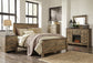 Trinell Queen Panel Bed with Dresser, Chest and 2 Nightstands Signature Design by Ashley®