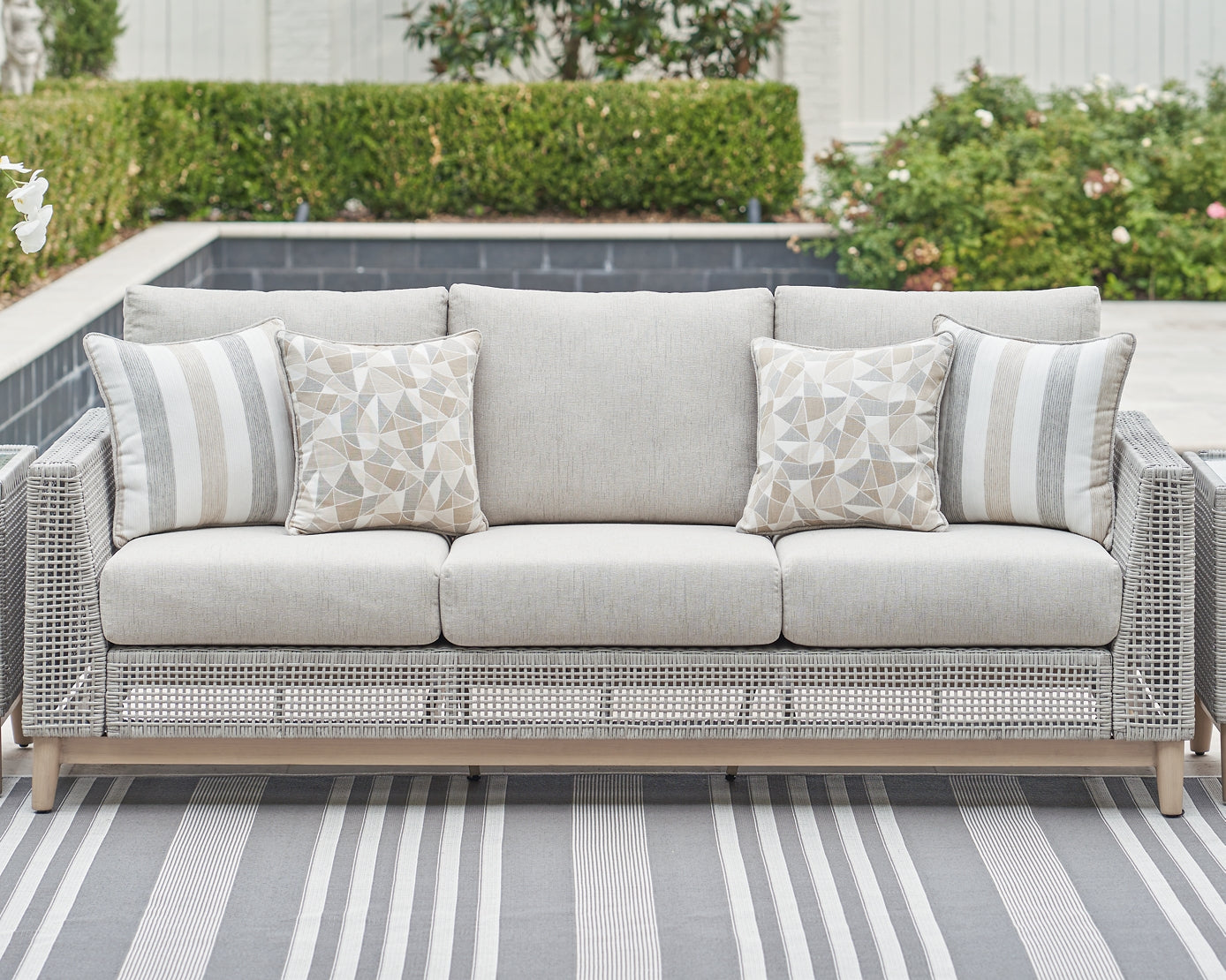 Seton Creek Outdoor Sofa and 2 Chairs with Coffee Table Signature Design by Ashley®