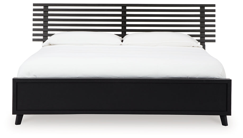 Danziar King Panel Bed with Mirrored Dresser and Chest Signature Design by Ashley®