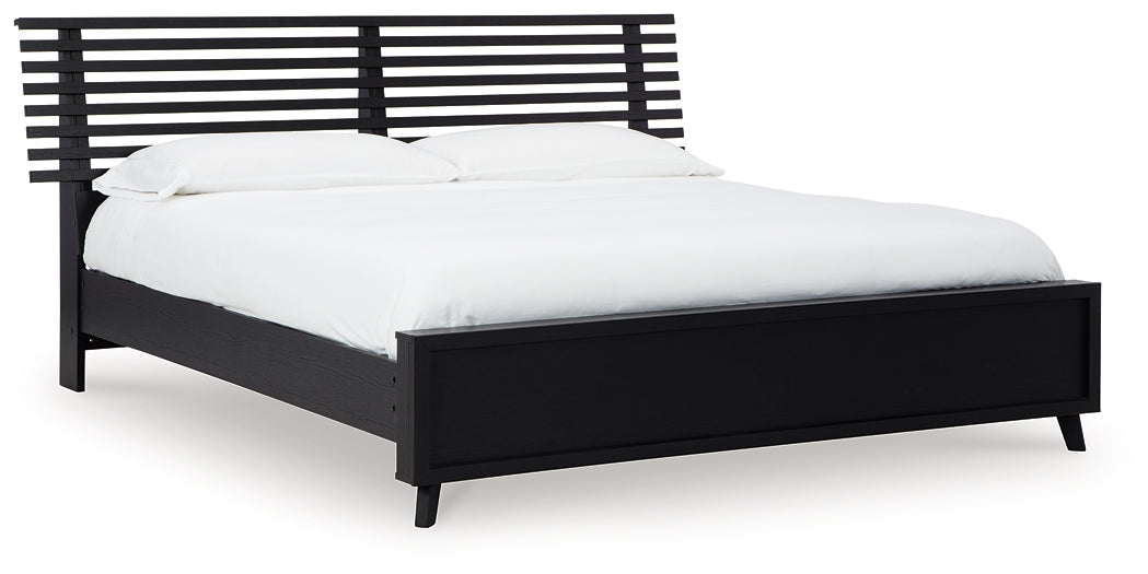 Danziar King Panel Bed with Mirrored Dresser and Chest Signature Design by Ashley®