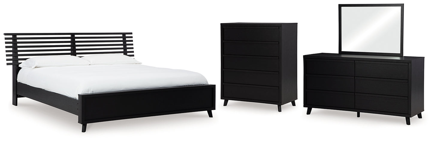 Danziar King Panel Bed with Mirrored Dresser and Chest Signature Design by Ashley®