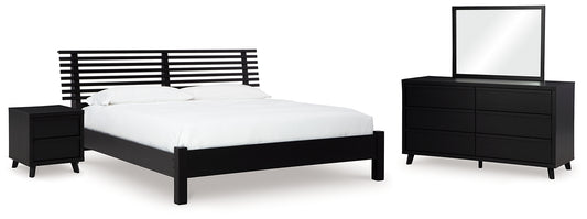 Danziar King Panel Bed with Mirrored Dresser and Nightstand Signature Design by Ashley®