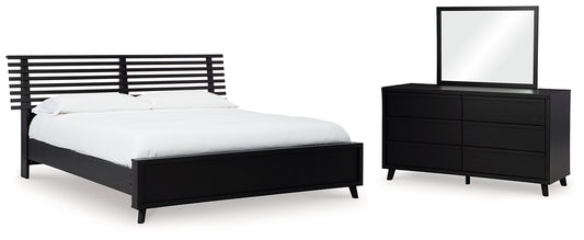 Danziar King Panel Bed with Mirrored Dresser Signature Design by Ashley®