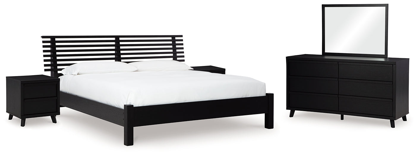 Danziar Queen Panel Bed with Mirrored Dresser and 2 Nightstands Signature Design by Ashley®