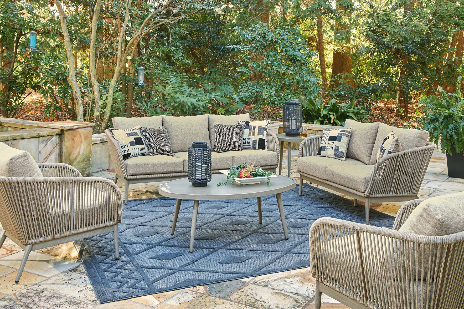 Swiss Valley Outdoor Sofa and  2 Lounge Chairs with Coffee Table and 2 End Tables Signature Design by Ashley®