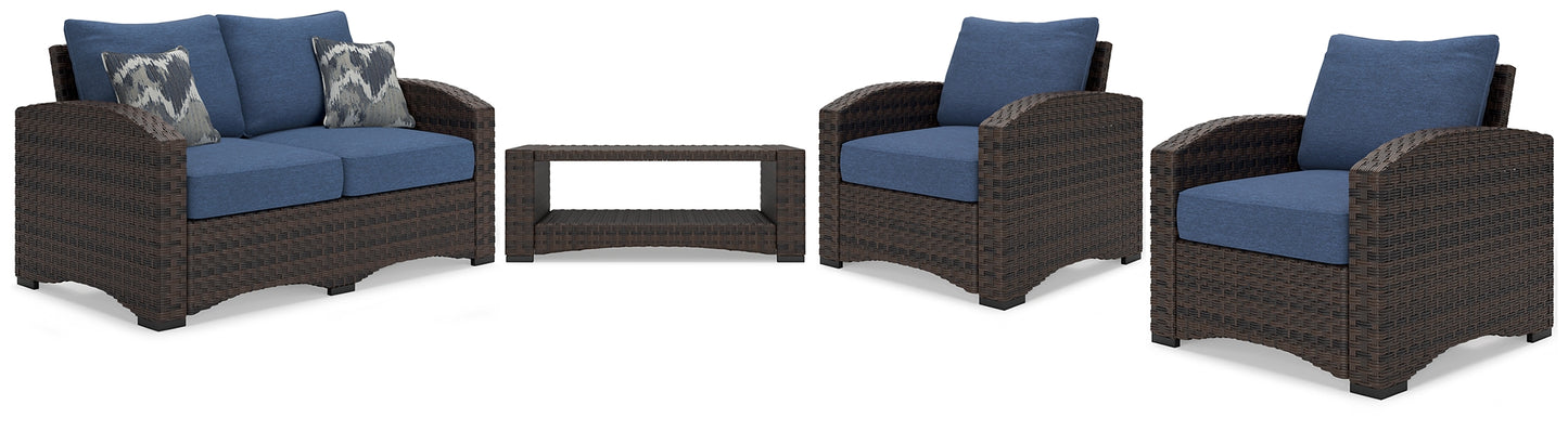 Windglow Outdoor Loveseat and 2 Chairs with Coffee Table Signature Design by Ashley®