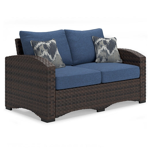 Windglow Outdoor Loveseat and 2 Chairs with Coffee Table Signature Design by Ashley®