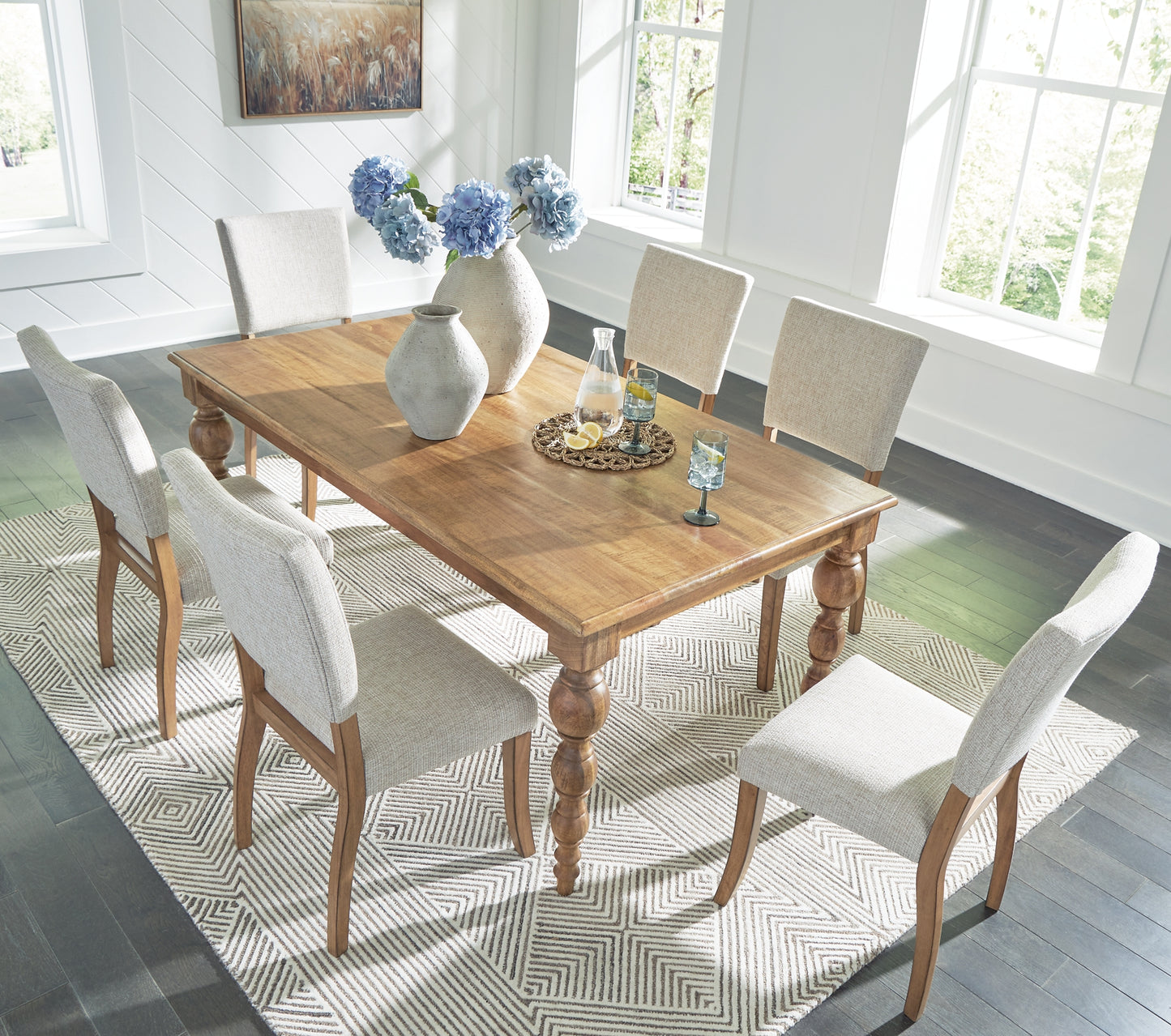 Rybergston Dining Table and 6 Chairs Signature Design by Ashley®