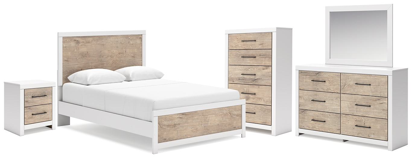 Charbitt Queen Panel Bed with Mirrored Dresser, Chest and Nightstand Signature Design by Ashley®