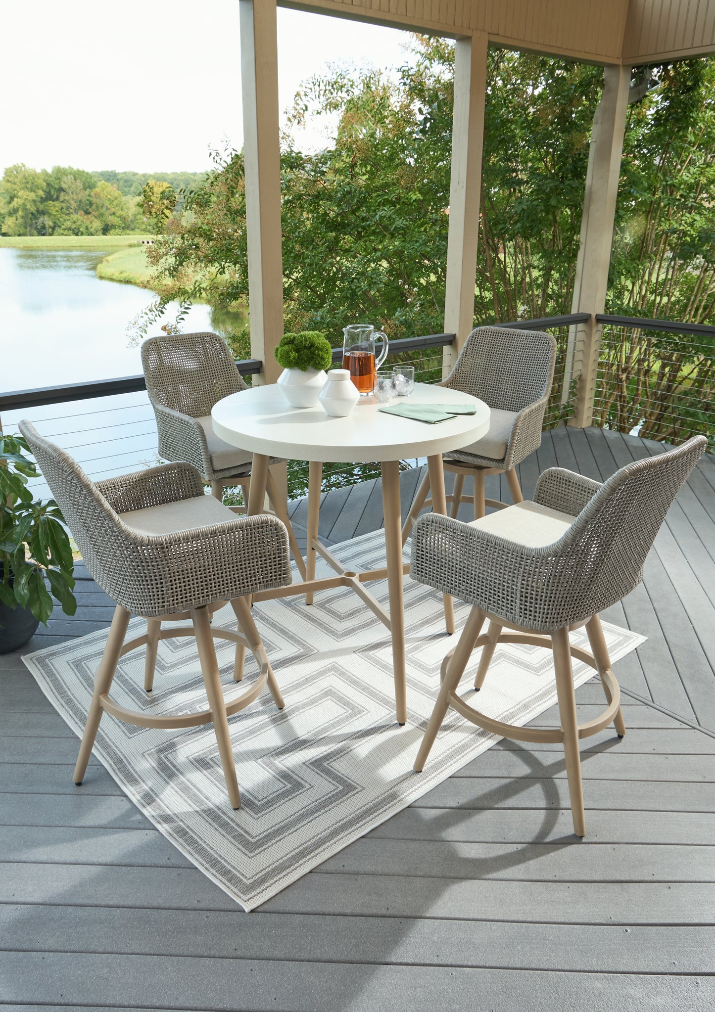 Seton Creek Outdoor Bar Table and 4 Barstools Signature Design by Ashley®