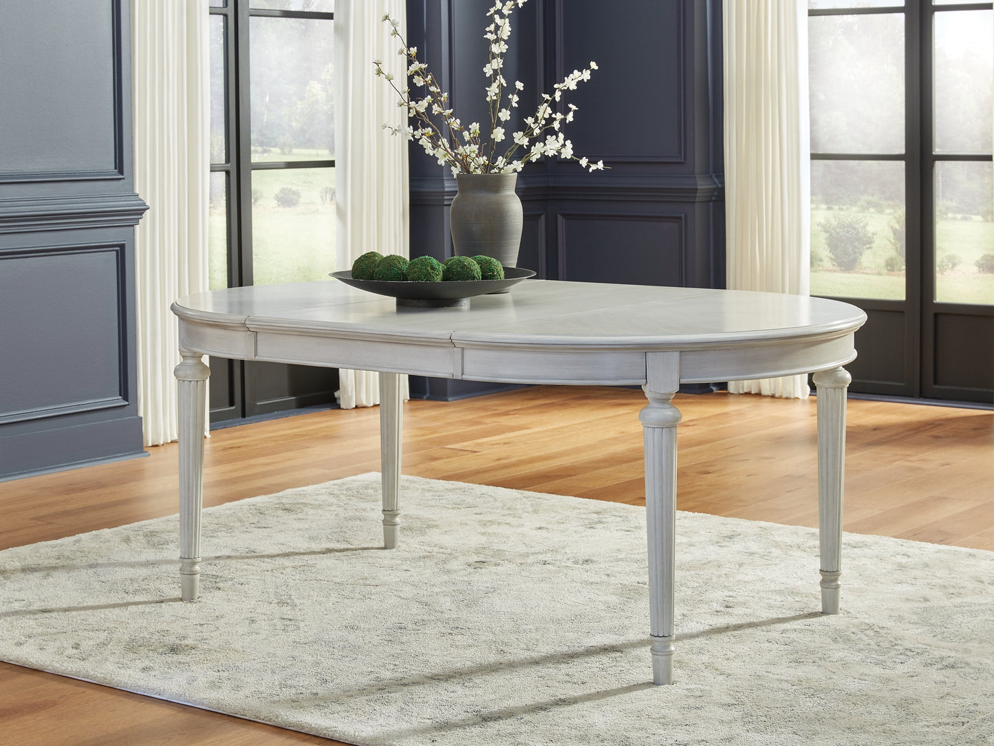 Montelaine Oval Dining Room EXT Table Benchcraft®