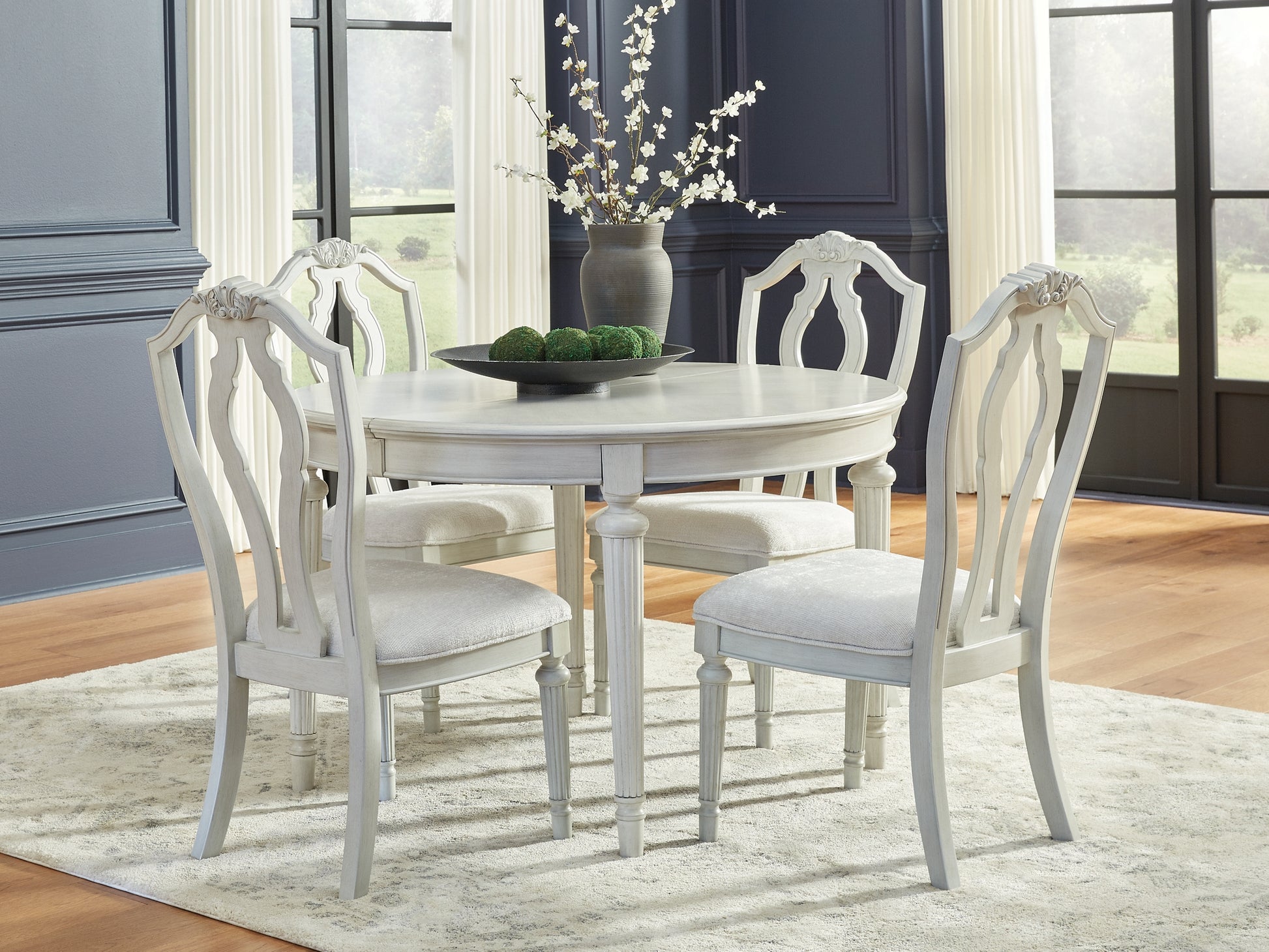 Montelaine Dining Table and 4 Chairs Benchcraft®