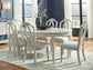 Montelaine Dining Table and 6 Chairs Benchcraft®