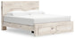 Lawroy King Panel Storage Bed with Mirrored Dresser and Nightstand Benchcraft®