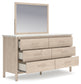 Cadmori Queen Upholstered Panel Bed with Mirrored Dresser, Chest and Nightstand Signature Design by Ashley®