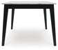 Jettaya Dining Table and 6 Chairs Signature Design by Ashley®