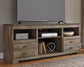 Trinell LG TV Stand w/Fireplace Option Signature Design by Ashley®