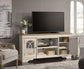 Realyn XL TV Stand w/Fireplace Option Signature Design by Ashley®