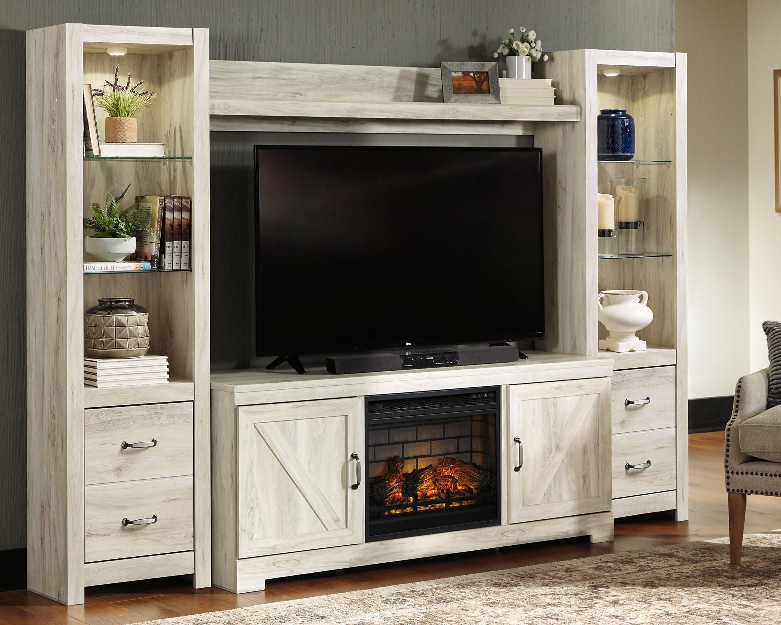 Bellaby 4-Piece Entertainment Center with Electric Fireplace Signature Design by Ashley®