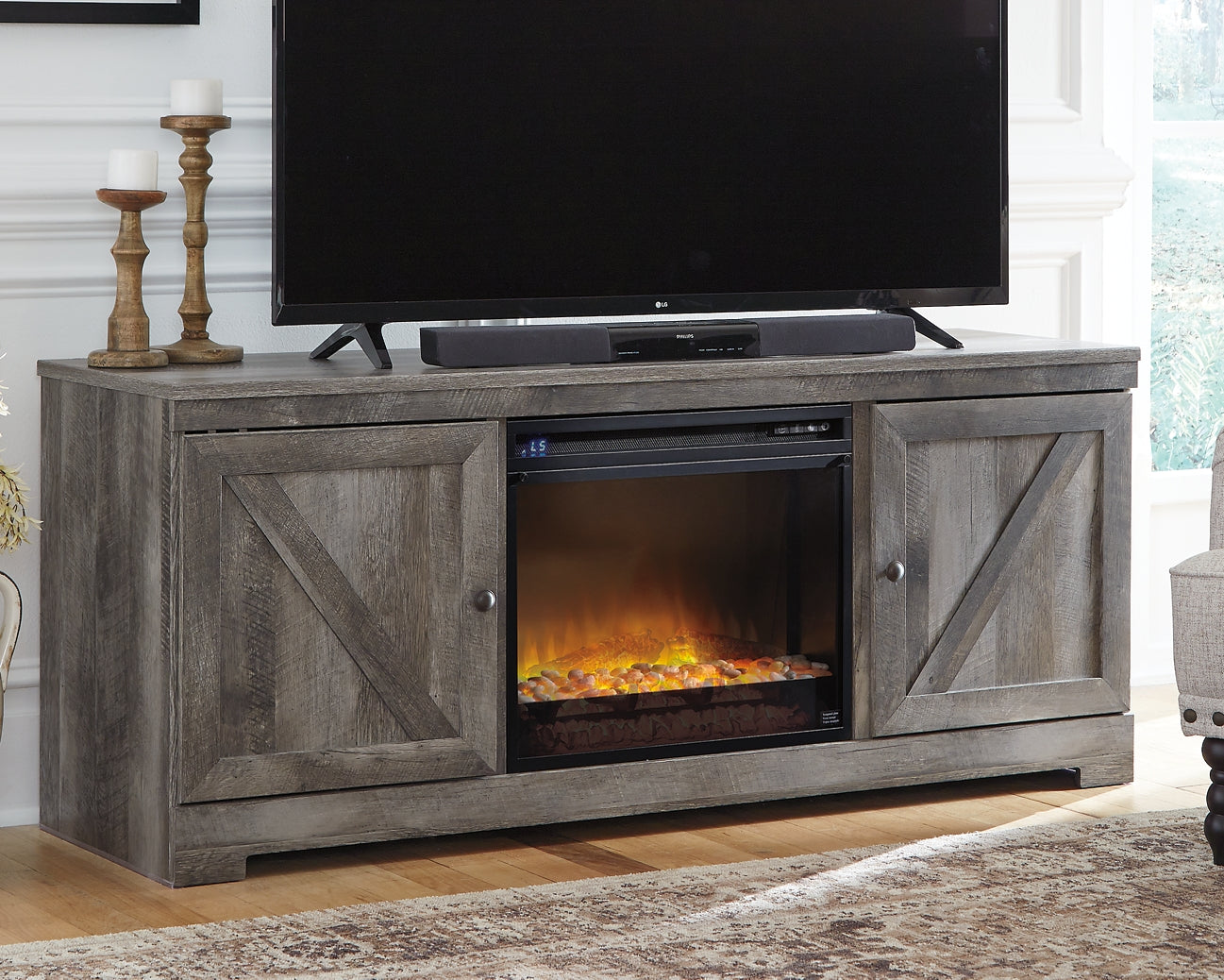 Wynnlow 63" TV Stand with Electric Fireplace Signature Design by Ashley®