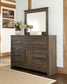 Juararo King Panel Bed with Mirrored Dresser and 2 Nightstands Signature Design by Ashley®