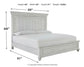 Kanwyn Queen Panel Bed with Mirrored Dresser, Chest and Nightstand Benchcraft®