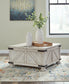 Carynhurst Coffee Table with 2 End Tables Signature Design by Ashley®