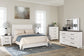 Gerridan Queen Panel Bed with Mirrored Dresser, Chest and 2 Nightstands Signature Design by Ashley®