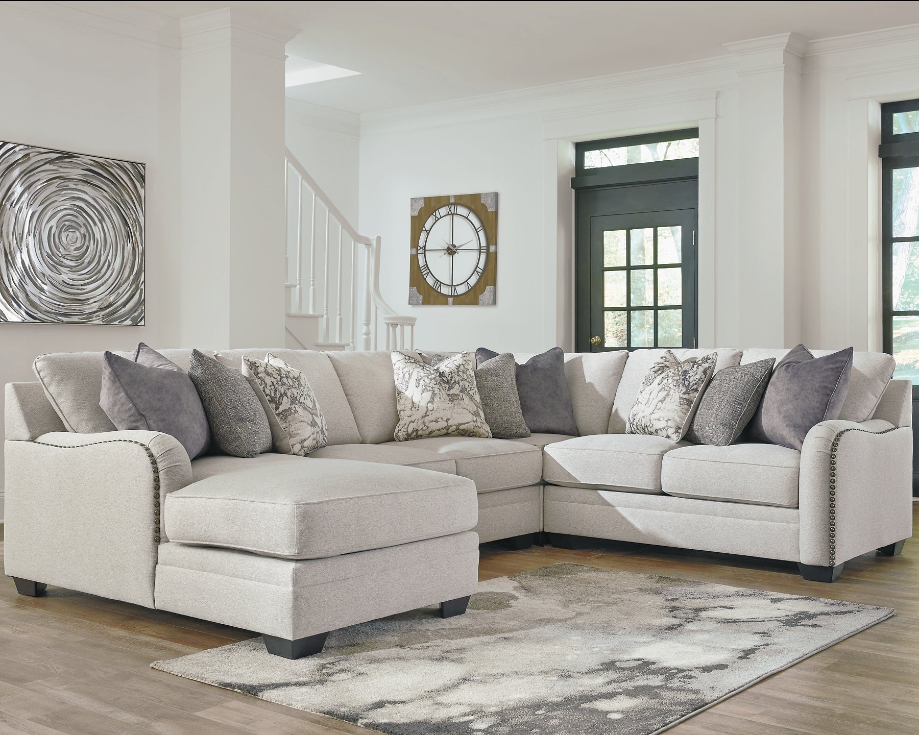 Dellara 4-Piece Sectional with Ottoman Benchcraft®