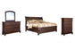 Porter California King Sleigh Bed with Mirrored Dresser and Chest Millennium® by Ashley