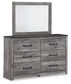 Bronyan Queen Panel Bed with Mirrored Dresser and Chest Signature Design by Ashley®