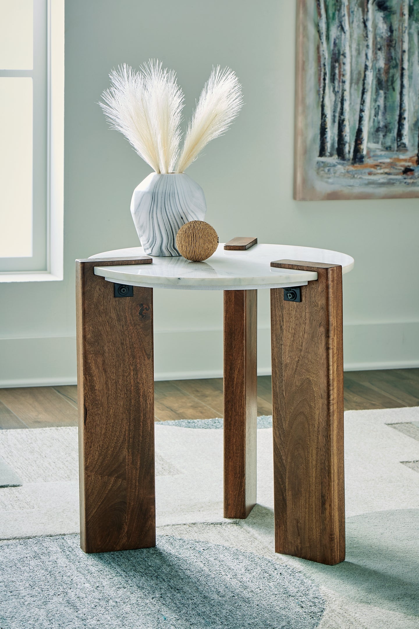 Isanti Round End Table Signature Design by Ashley®