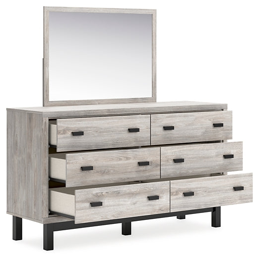 Vessalli King Panel Bed with Mirrored Dresser Signature Design by Ashley®