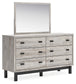 Vessalli King Panel Bed with Mirrored Dresser Signature Design by Ashley®