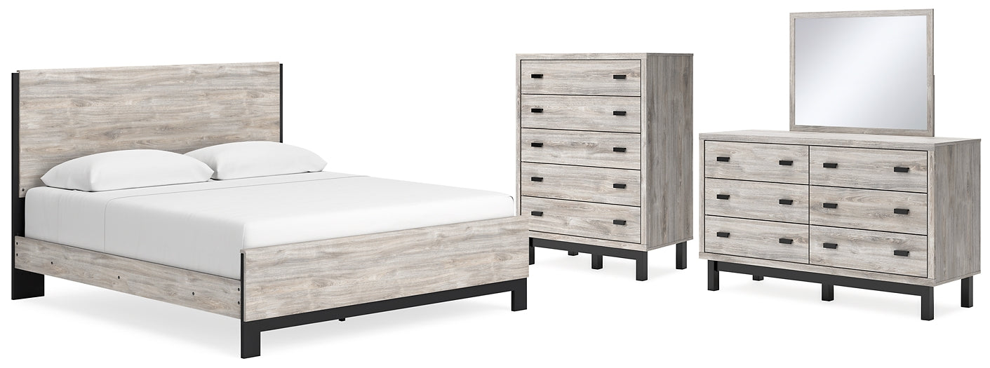 Vessalli King Panel Bed with Mirrored Dresser and Chest Signature Design by Ashley®