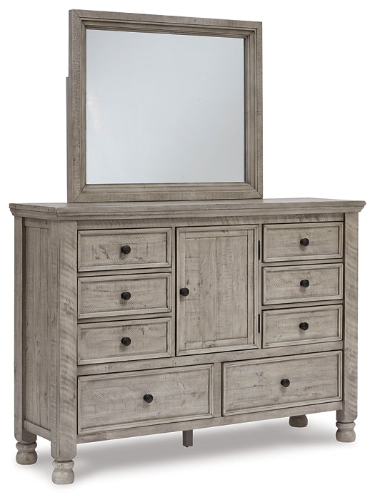 Harrastone Queen Panel Bed with Mirrored Dresser and Chest Millennium® by Ashley